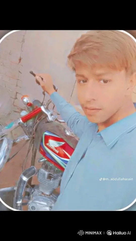 Young Man on Motorcycle: A Warm, Soft-Lit Scene – AI Generated Video | Hailuo AI