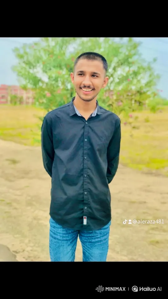 Young Man in Sunlit Field: A Serene Close-Up – AI Generated Video | Hailuo AI