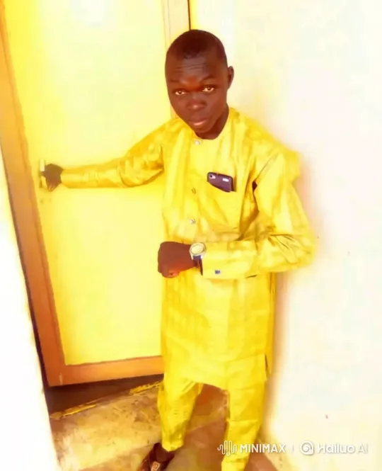Young Man Walking Steadily Across Yellow-Walled Room – AI Generated Video | Hailuo AI