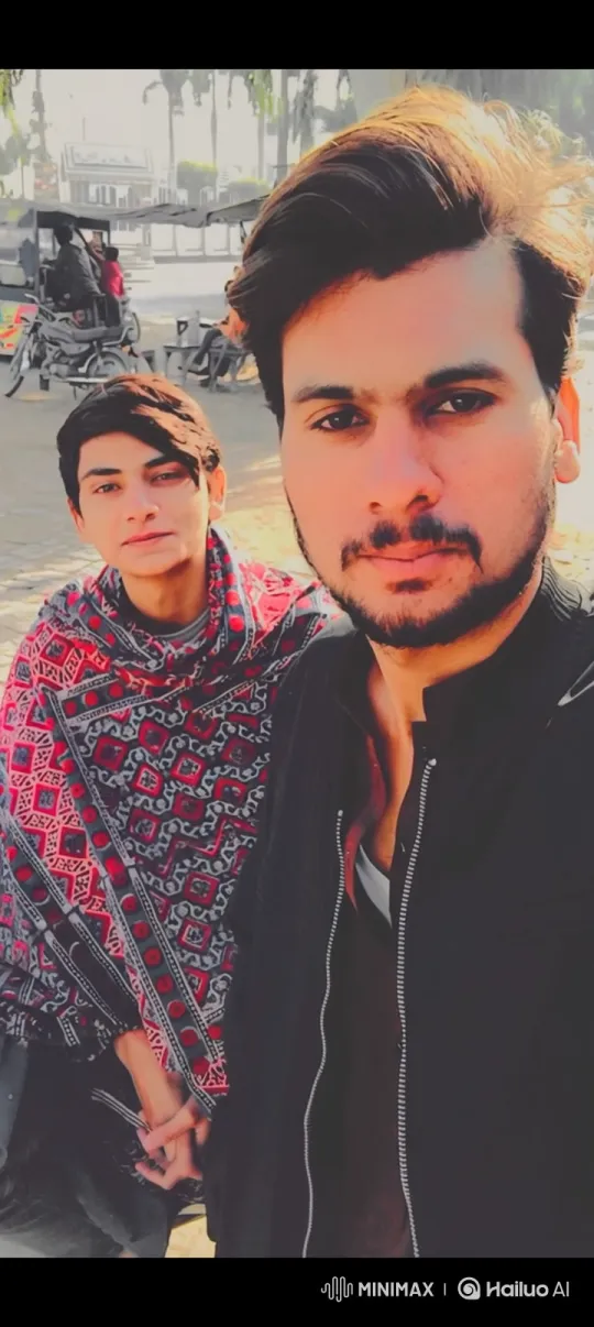 Young Men Sharing Genuine Laughter in Sunny Park – AI Generated Video | Hailuo AI