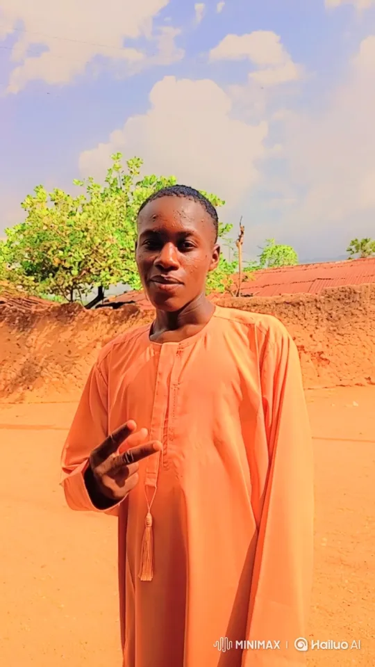 Young Man in Peace Sign Amidst Sandy Landscape – AI Generated Video | Hailuo AI