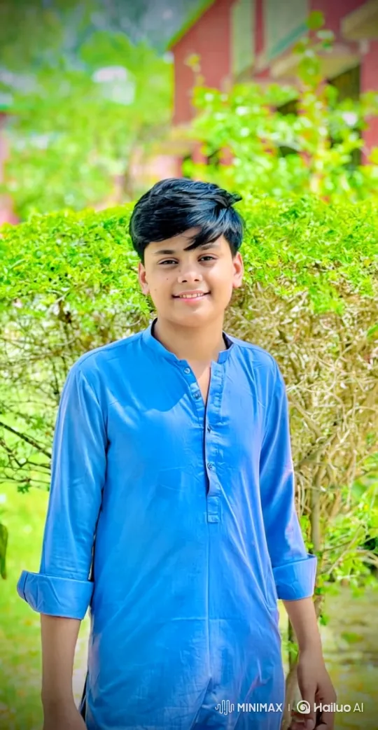 Boy Smiles Gently Outdoors Amidst Rustling Bushes – AI Generated Video | Hailuo AI