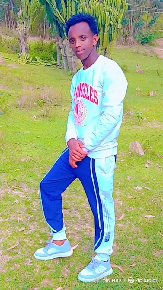Young Man Poses with Subtle Smile in Outdoor Setting – AI Generated Video | Hailuo AI