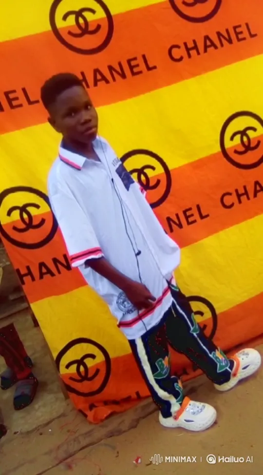 Young Boy Joyfully Throws Money in Luxury Brand-Themed Video – AI Generated Video | Hailuo AI