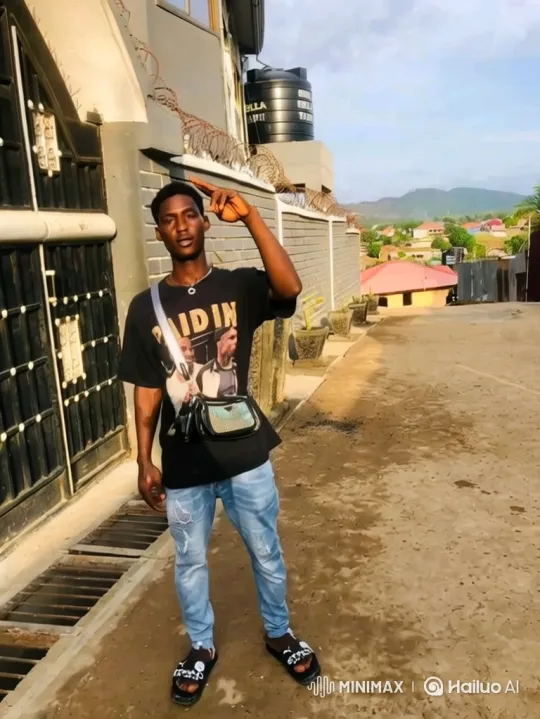 Young Man Poses Confidently in an Outdoor Environment – AI Generated Video | Hailuo AI