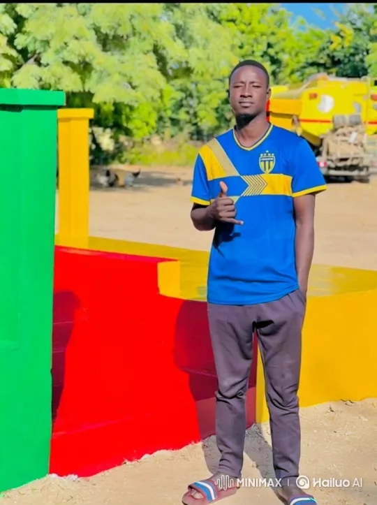 Young Man in Casual Pose with Colorful Background – AI Generated Video | Hailuo AI