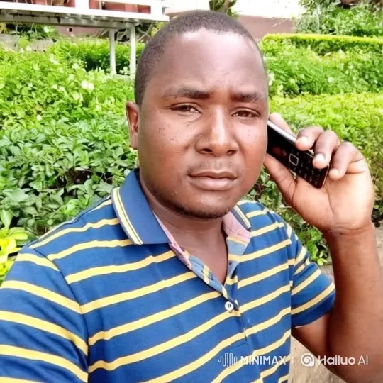 Man on Phone in Verdant Garden - Tracking Shot – AI Generated Video | Hailuo AI