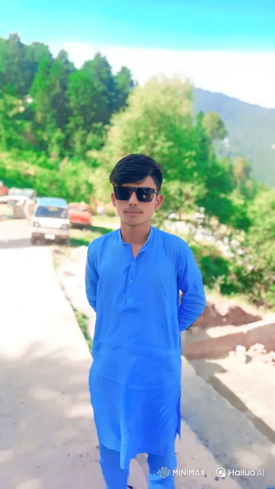 Young Man Admires Scenic Mountain Landscape – AI Generated Video | Hailuo AI