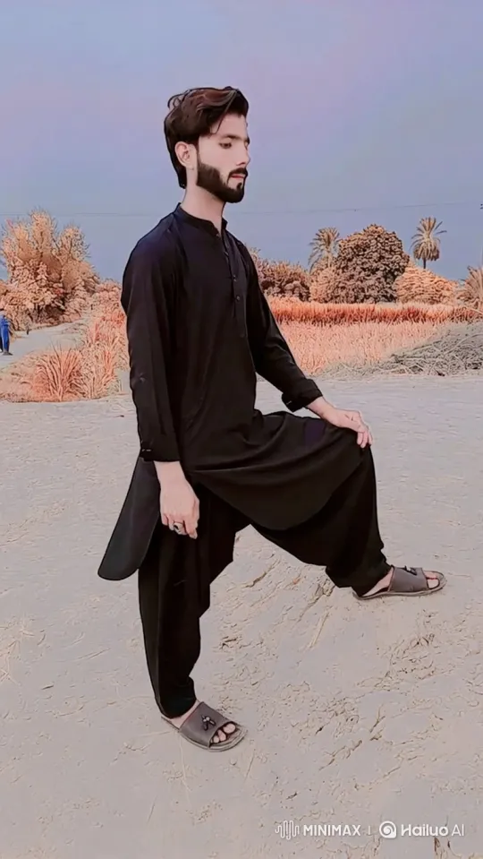 Man Walks Through Arid Landscape in Steady Pace – AI Generated Video | Hailuo AI