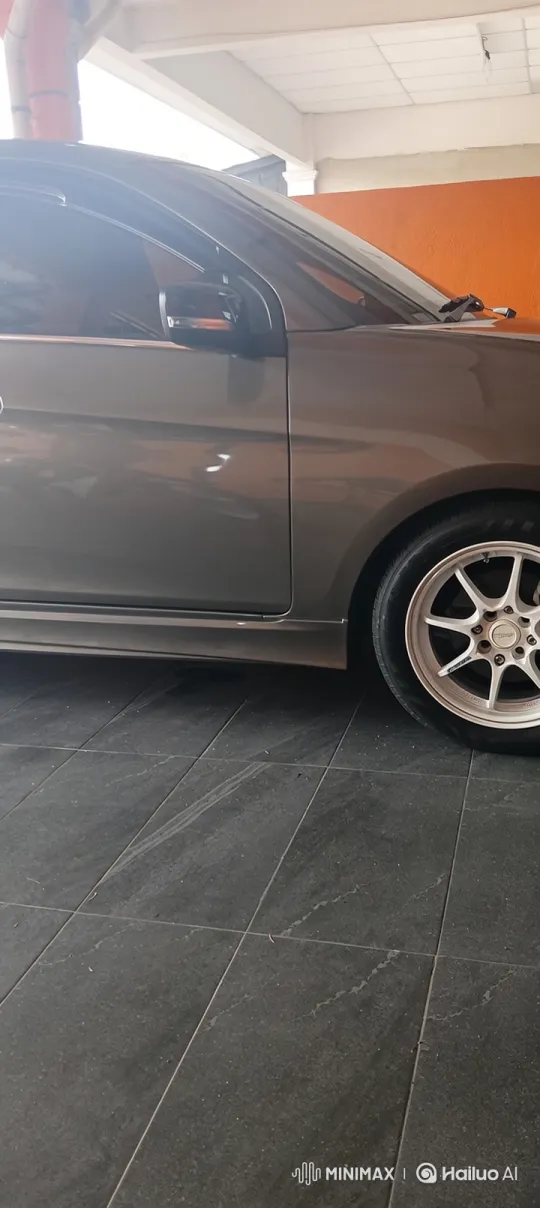 Car Lowering on Garage Floor with Air Suspension – AI Generated Video | Hailuo AI