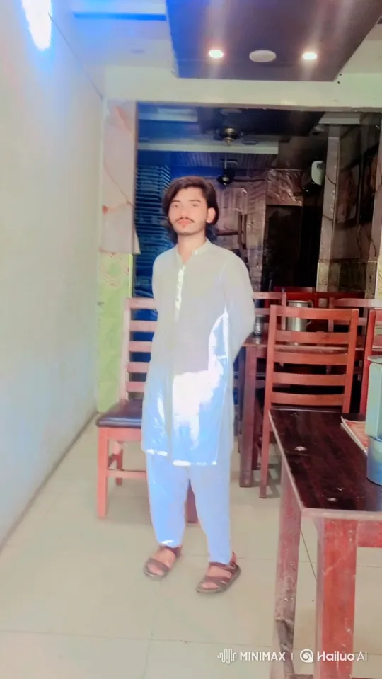 Static and Tracking Shots of a Man in a Dining Establishment – AI Generated Video | Hailuo AI
