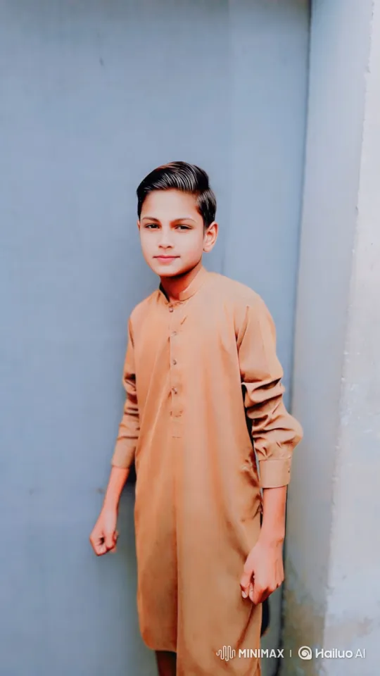 Young Boy Stands Still Amidst Evolving Visual Effects – AI Generated Video | Hailuo AI