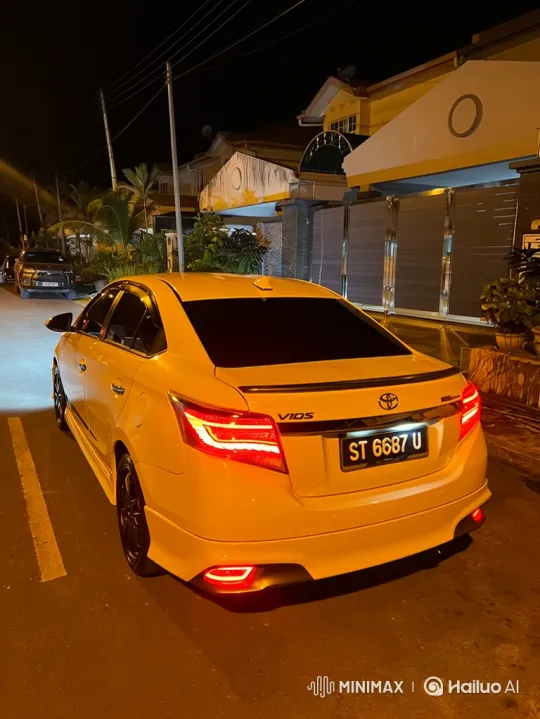 White Sedan's Dynamic Air Suspension Display – AI Generated Video | Hailuo AI