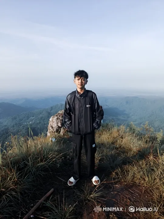 Young Man Practices Kung Fu on Mountain Top – AI Generated Video | Hailuo AI