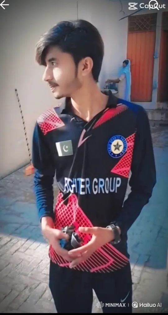 Young Man Reflects with Gloves in Sunlit Patio Scene – AI Generated Video | Hailuo AI