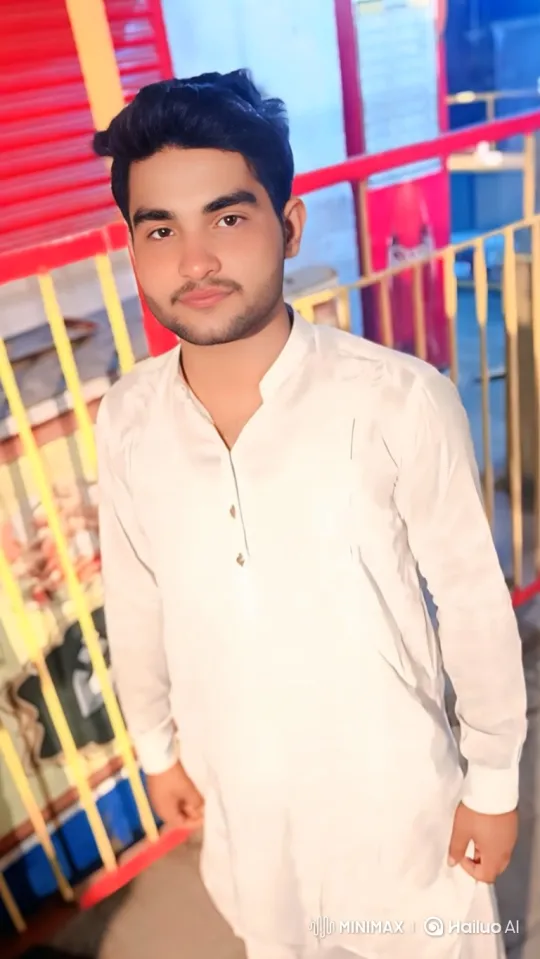 Young Man in White Shirt with Soft Smile – AI Generated Video | Hailuo AI