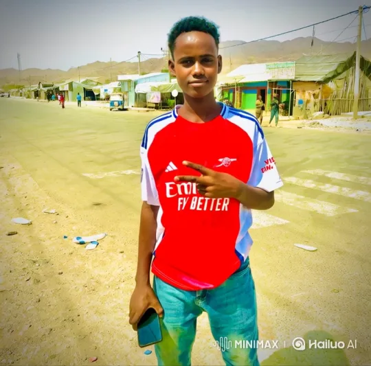 Young Man in Football Jersey Smiles, Walks Away – AI Generated Video | Hailuo AI