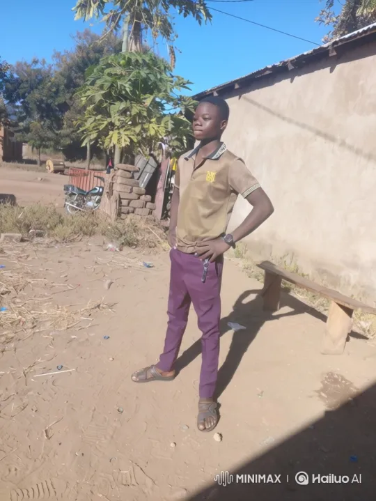 Young Man in Confident Pose Amidst Sunny Landscape – AI Generated Video | Hailuo AI