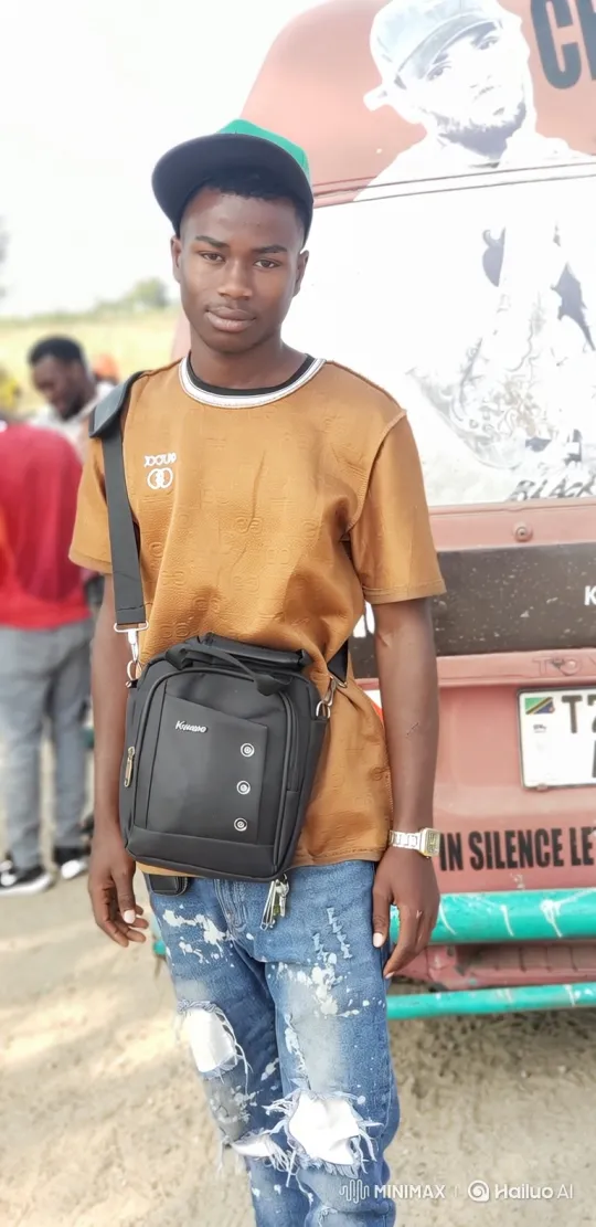 Young Black Man in Casual Outfit Stands Calmly Outside – AI Generated Video | Hailuo AI