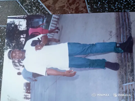 Man in White Shirt Enters Car on Sidewalk – AI Generated Video | Hailuo AI