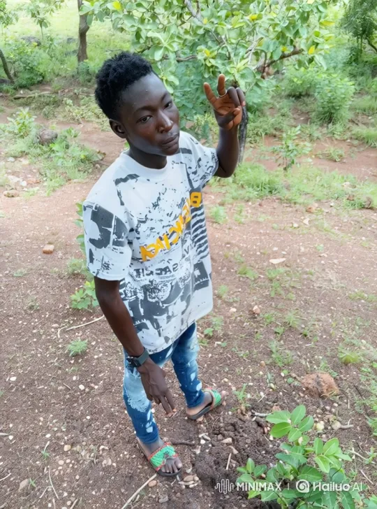 Young Man in Woods Shifts Stance, Smiles – AI Generated Video | Hailuo AI