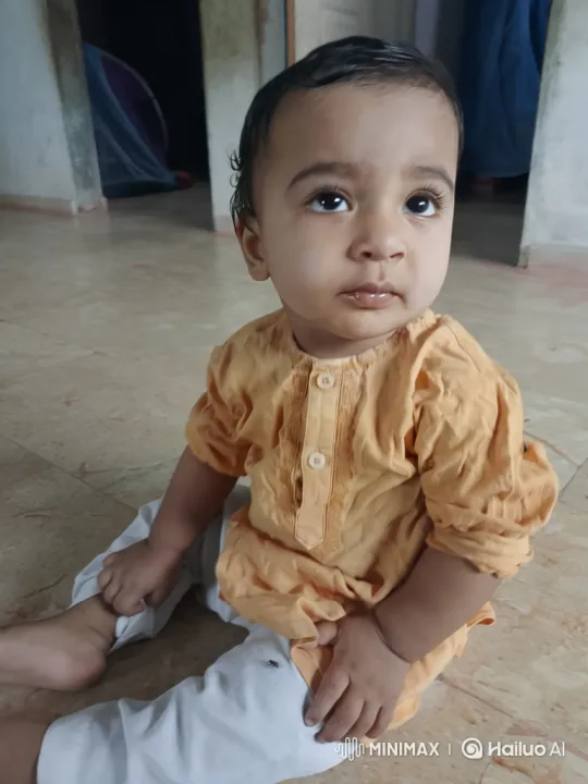 Baby's Gentle Movements and Curious Gaze Captured – AI Generated Video | Hailuo AI