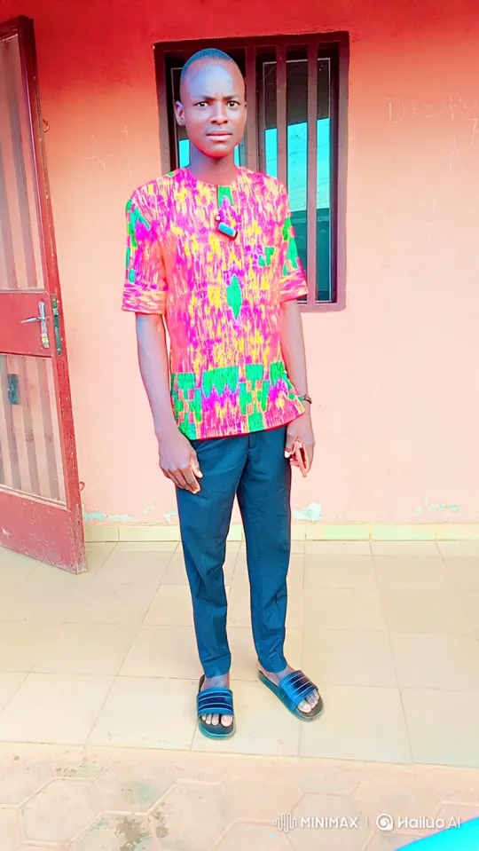 Young Man in Colorful Shirt Stands Calmly – AI Generated Video | Hailuo AI