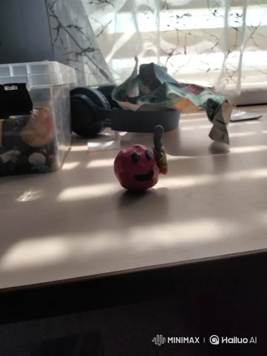 Clay Figure Shatters in Sunlit Desk Scene – AI Generated Video | Hailuo AI