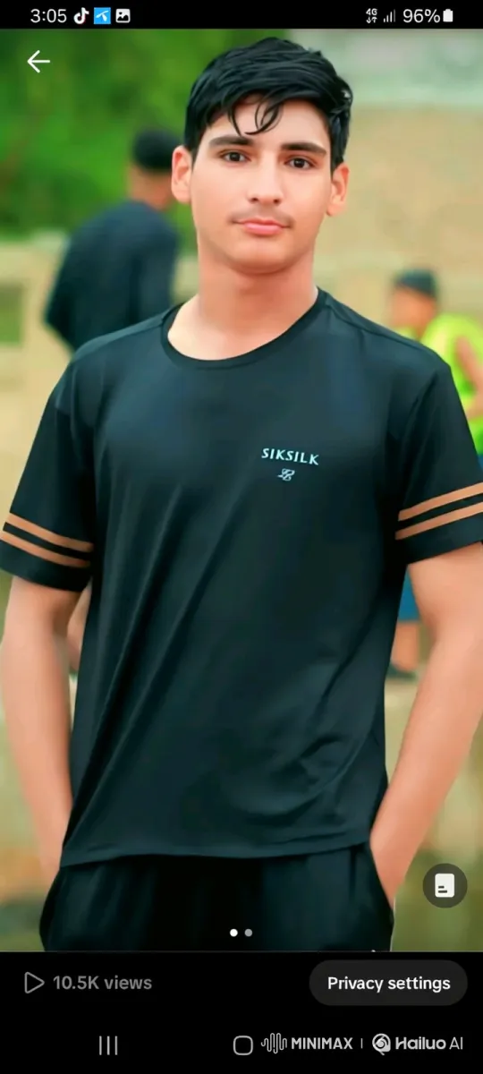Young Man Connects with Camera in Park Setting – AI Generated Video | Hailuo AI