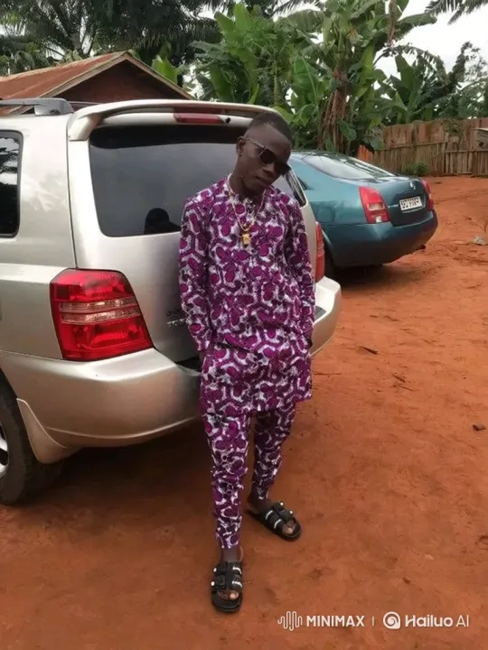 Young Man in Stylish Outfit Poses Confidently Smiling – AI Generated Video | Hailuo AI