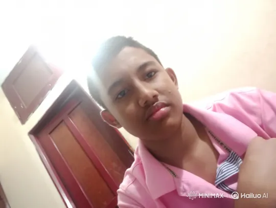 Young Person Smiles Gently at Camera – AI Generated Video | Hailuo AI