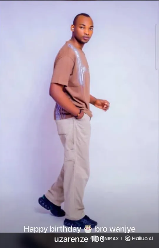 Young Man Walks Calmly Across Studio看向相机 – AI Generated Video | Hailuo AI