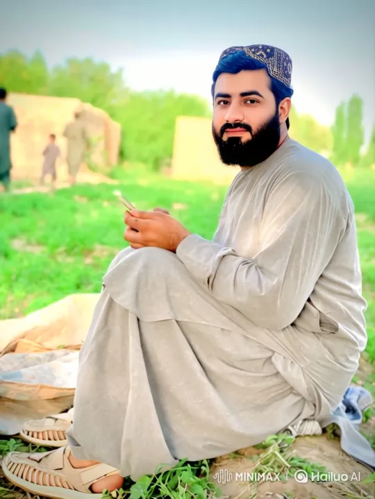Man with Beard Gazing Calmly in Outdoor Setting – AI Generated Video | Hailuo AI