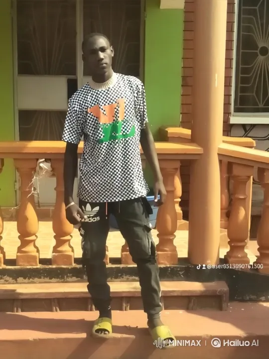 Confident Young Man Poses on Outdoor Steps – AI Generated Video | Hailuo AI