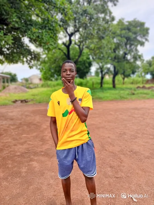 Young Man in Field Reflects, Smiles Gently – AI Generated Video | Hailuo AI