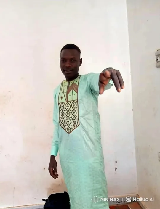 Young Man in Room with Embroidered Tunic – AI Generated Video | Hailuo AI