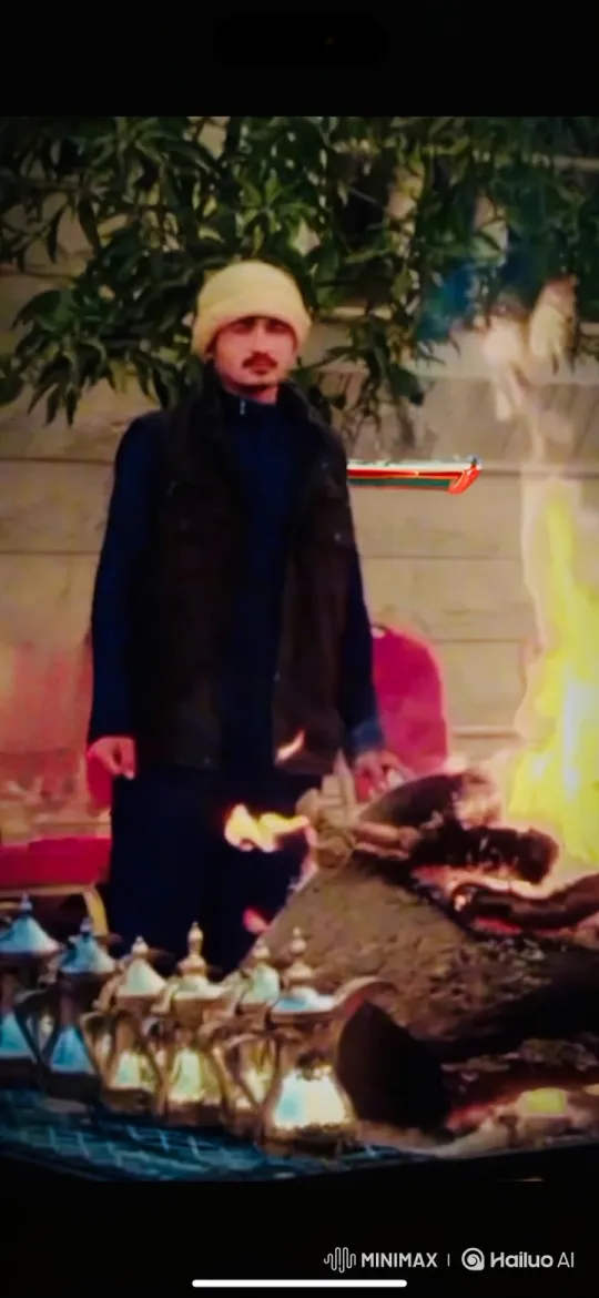 Man by Bonfire with Shimmering Metal Pots – AI Generated Video | Hailuo AI