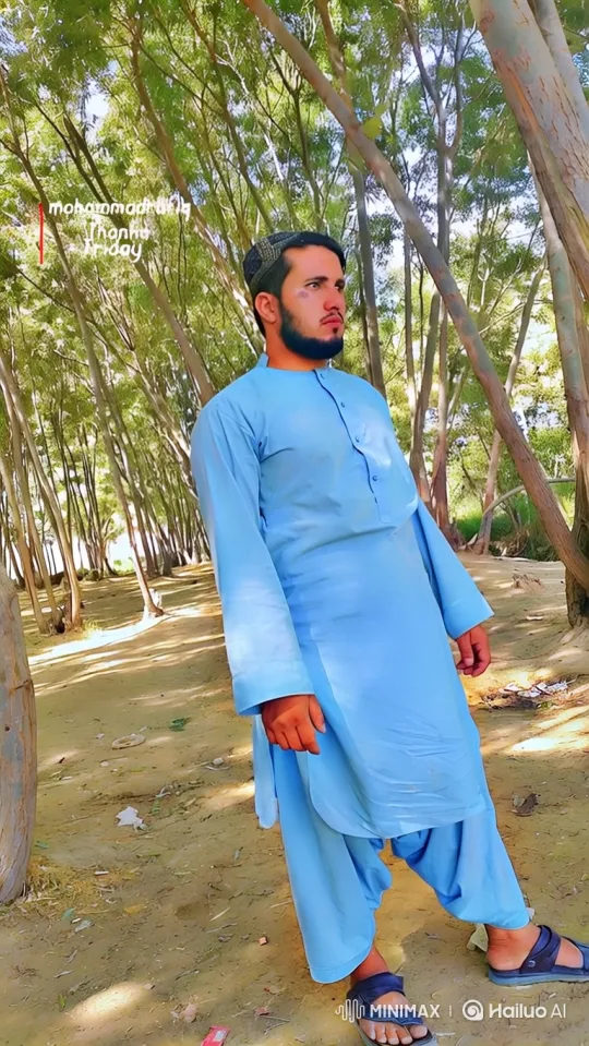 Pensive Man Walking Through Sunlit Woods – AI Generated Video | Hailuo AI