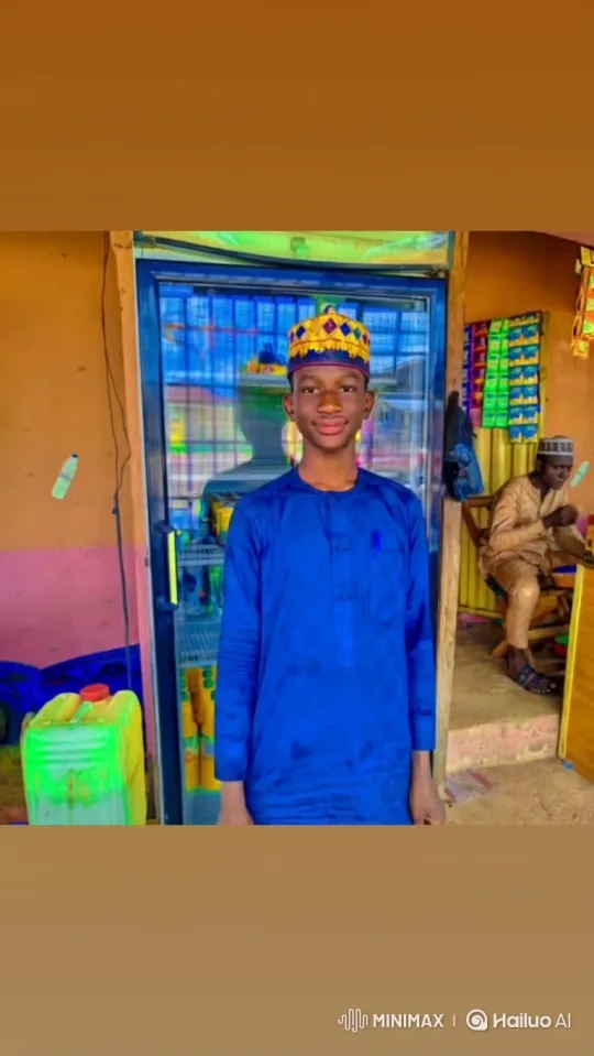 Young Man in Royal Blue Garment at Local Shopfront – AI Generated Video | Hailuo AI