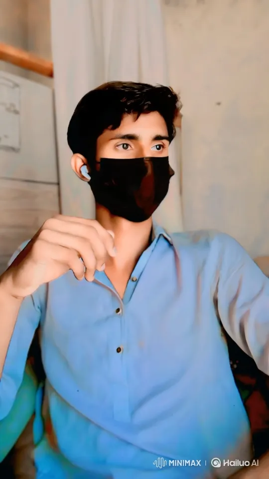 Young Man in Thoughtful Pose with Subtle Movement – AI Generated Video | Hailuo AI