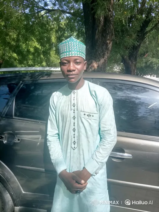 Young Man Reflects Outdoors with Gentle Smile – AI Generated Video | Hailuo AI
