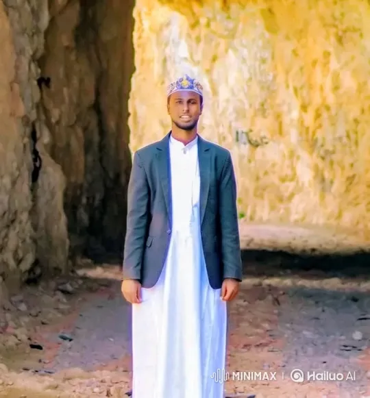 Man in White Stands in Canyon, Vehicle Arrives – AI Generated Video | Hailuo AI