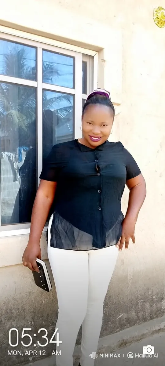 Woman Reflects on Photo with Amusement and Laughter – AI Generated Video | Hailuo AI