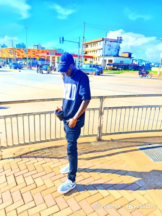 Man Stands Contemplatively on Bright City Sidewalk – AI Generated Video | Hailuo AI