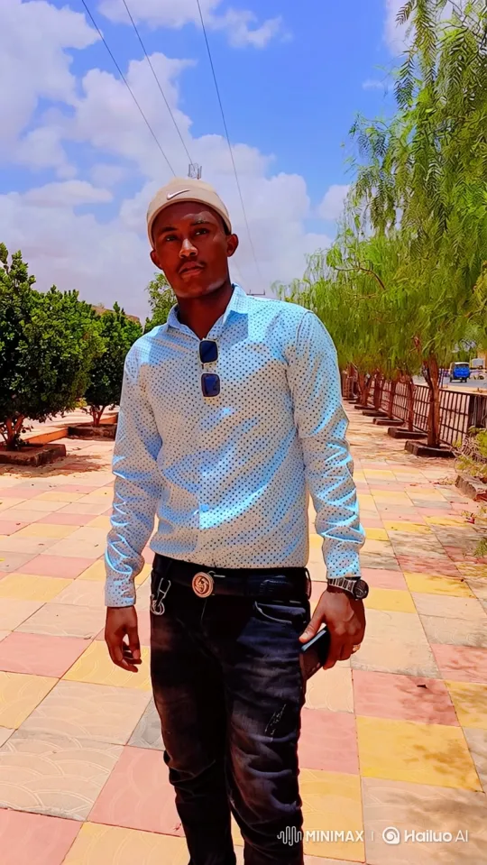 Young Man Reflects on Colorful Promenade – AI Generated Video | Hailuo AI