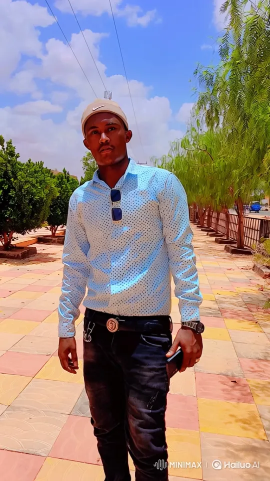 Man Walking Forward on Colorful Path with Tracking Camera Shot – AI Generated Video | Hailuo AI
