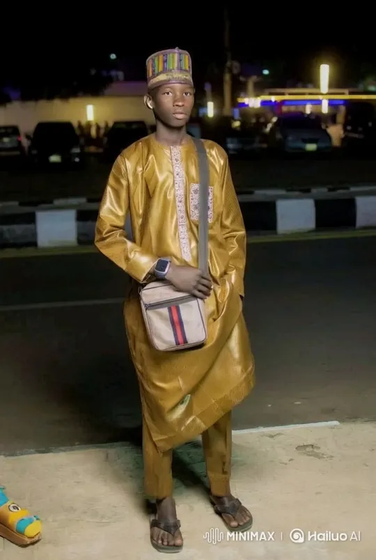 Young Man in Traditional Attire on a Quiet Night Street – AI Generated Video | Hailuo AI