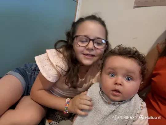 Young Girl and Baby Share a Tender Moment – AI Generated Video | Hailuo AI