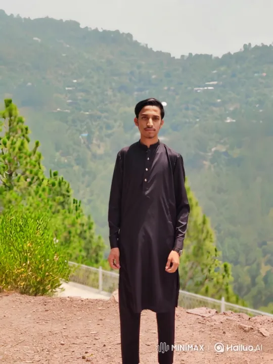 Young Man in Tranquil Landscape with Gentle Breeze – AI Generated Video | Hailuo AI