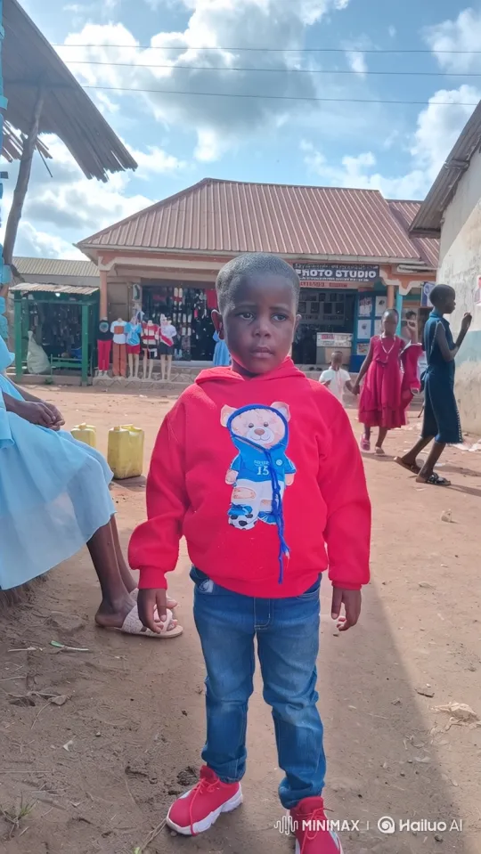 Introspective Child in Town Street: A Close-up Study – AI Generated Video | Hailuo AI